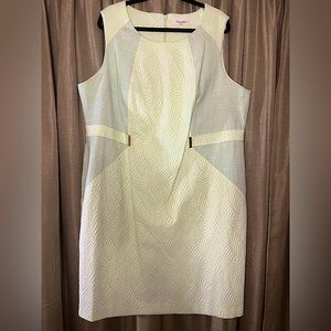 Calvin Klein textured sheath dress with gold accents in the front